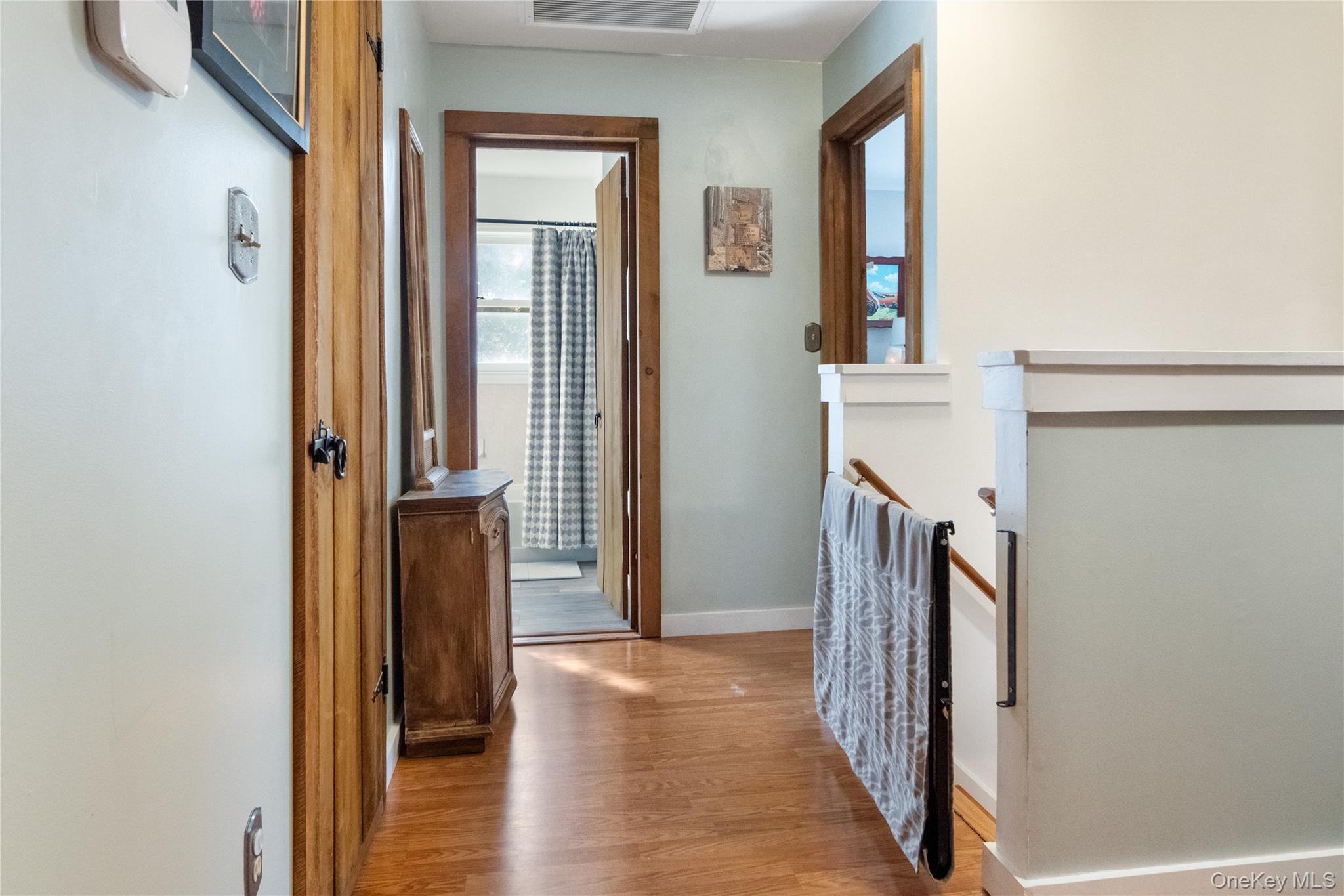 12 Chapel Road Newburgh, NY 12550 - Photo 26 of 46 a view of a hallway with wooden floor and staircase