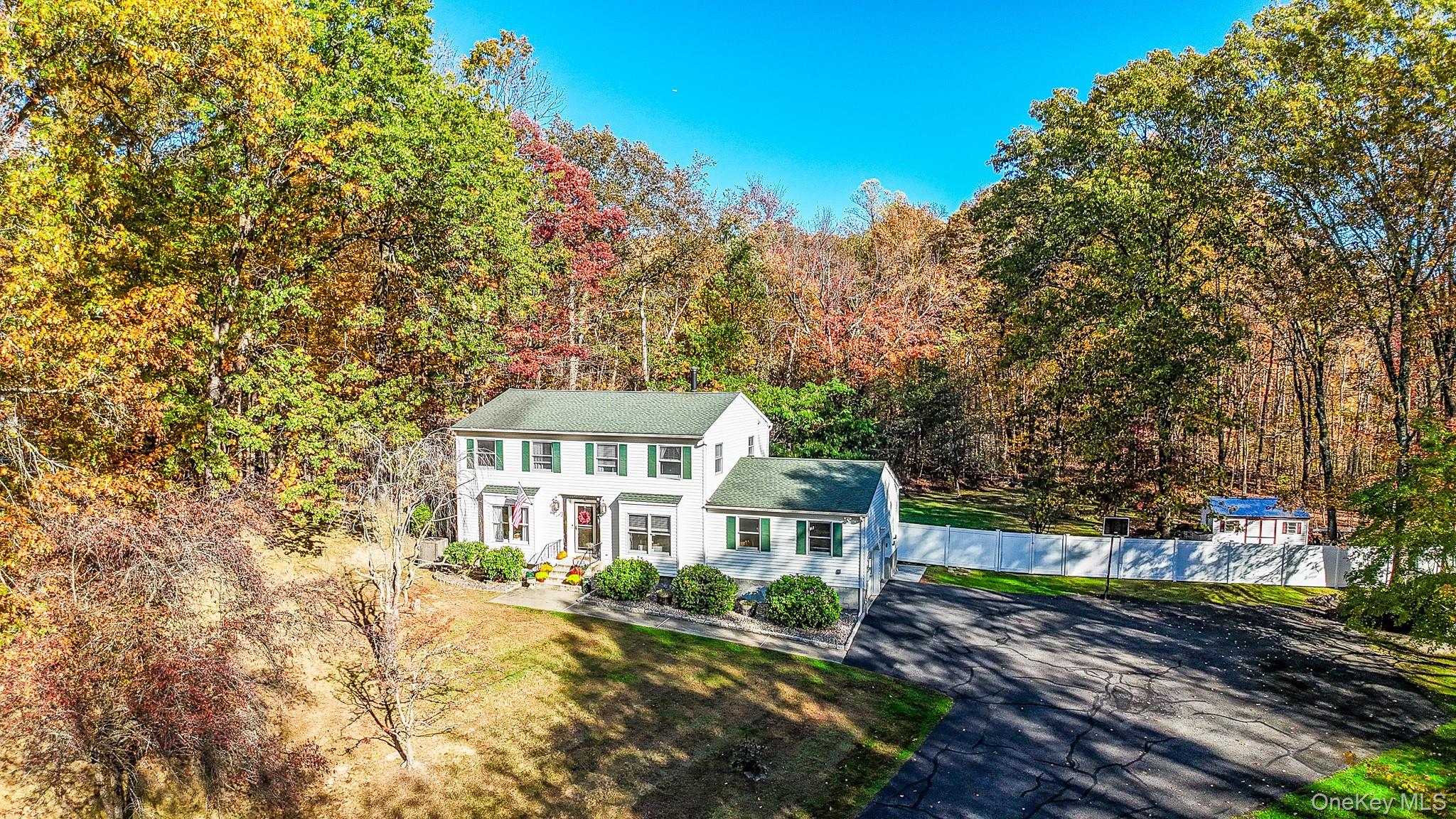 12 Chapel Road Newburgh, NY 12550 - Photo 3 of 46 a front view of a house with a yard