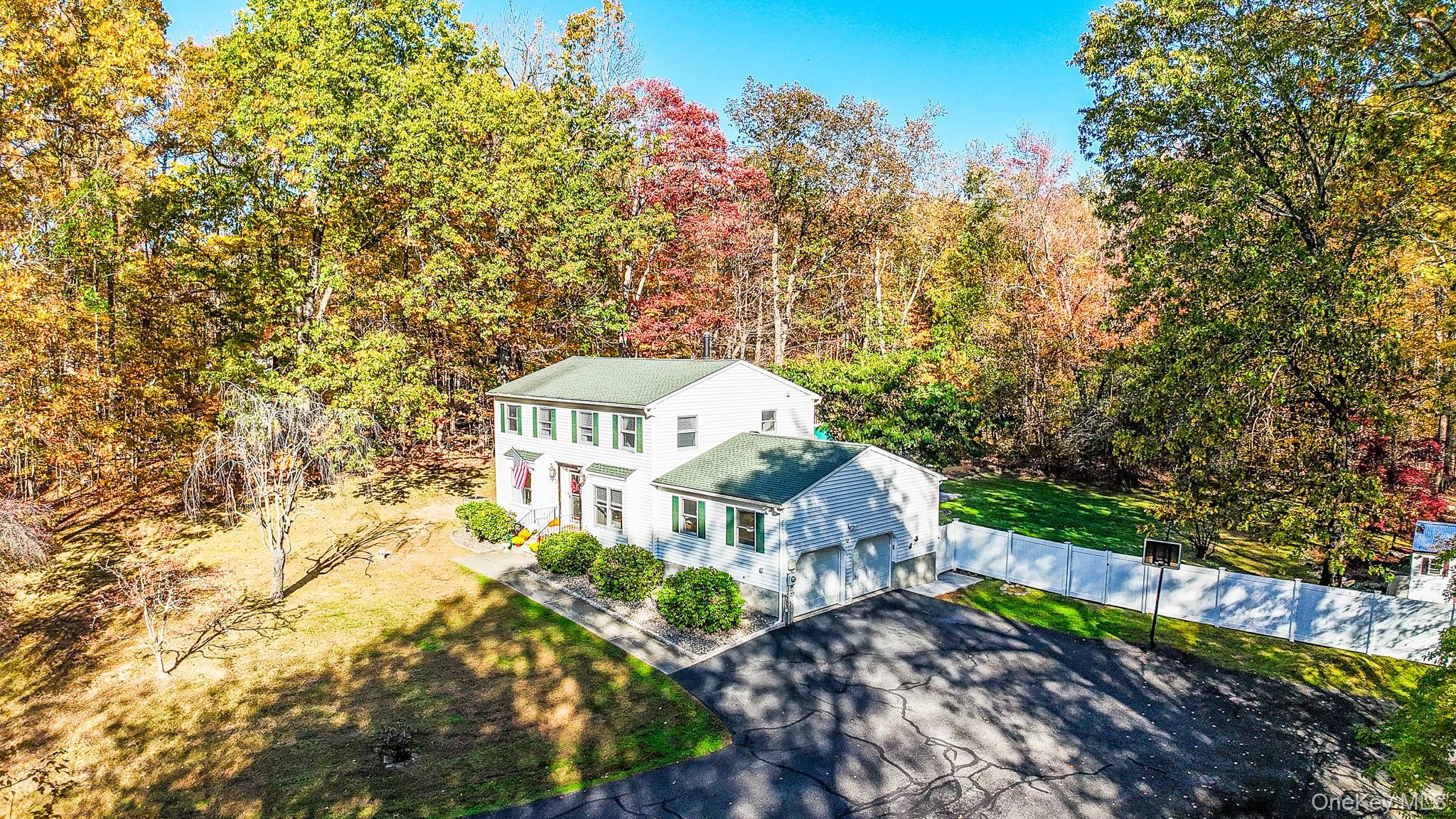 12 Chapel Road Newburgh, NY 12550 - Photo 40 of 46 a view of a large house with a big yard and large trees