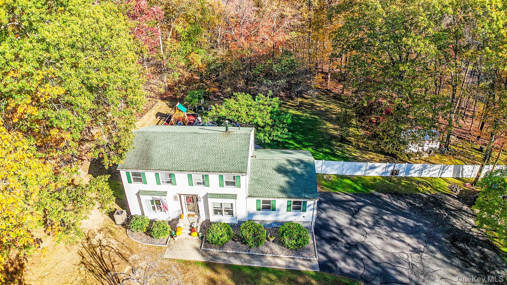 12 Chapel Road Newburgh, NY 12550 - Photo 41 of 46 front view of a house with a tree
