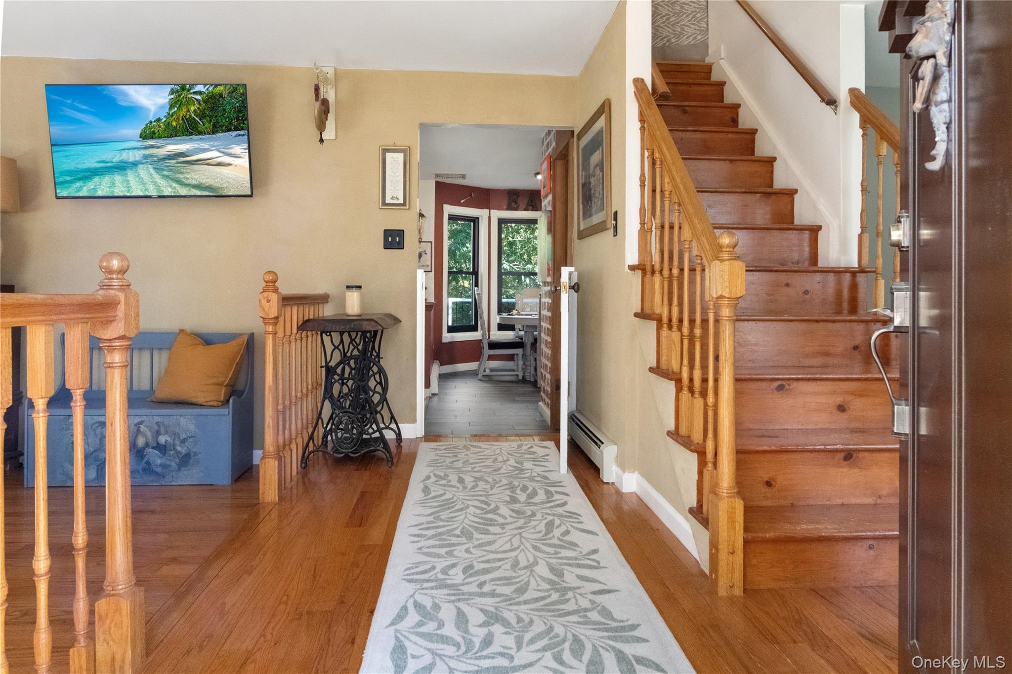 12 Chapel Road Newburgh, NY 12550 - Photo 6 of 46 a hallway with painting on the wall and a rug