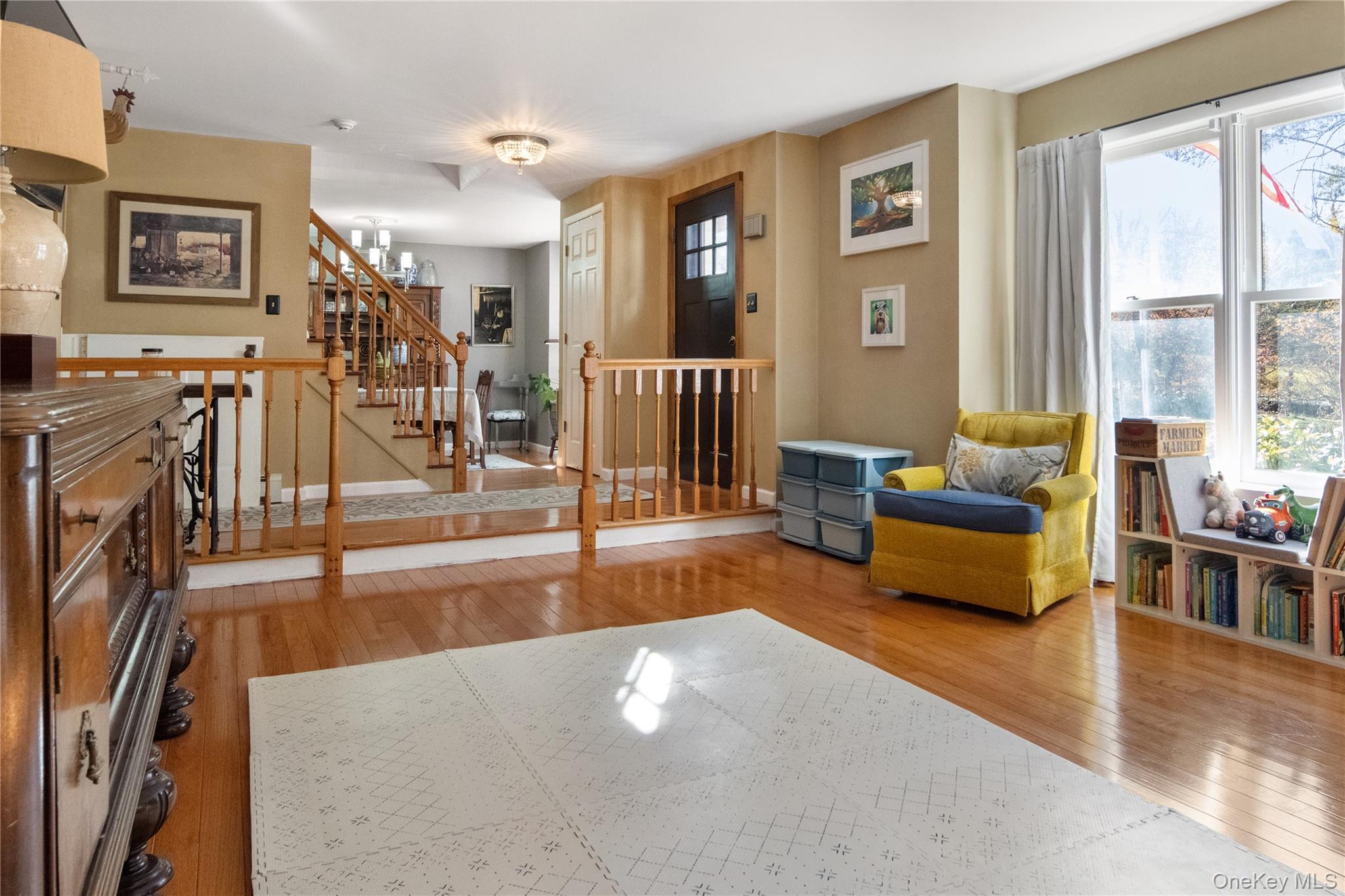 12 Chapel Road Newburgh, NY 12550 - Photo 8 of 46 a living room with furniture and a flat screen tv