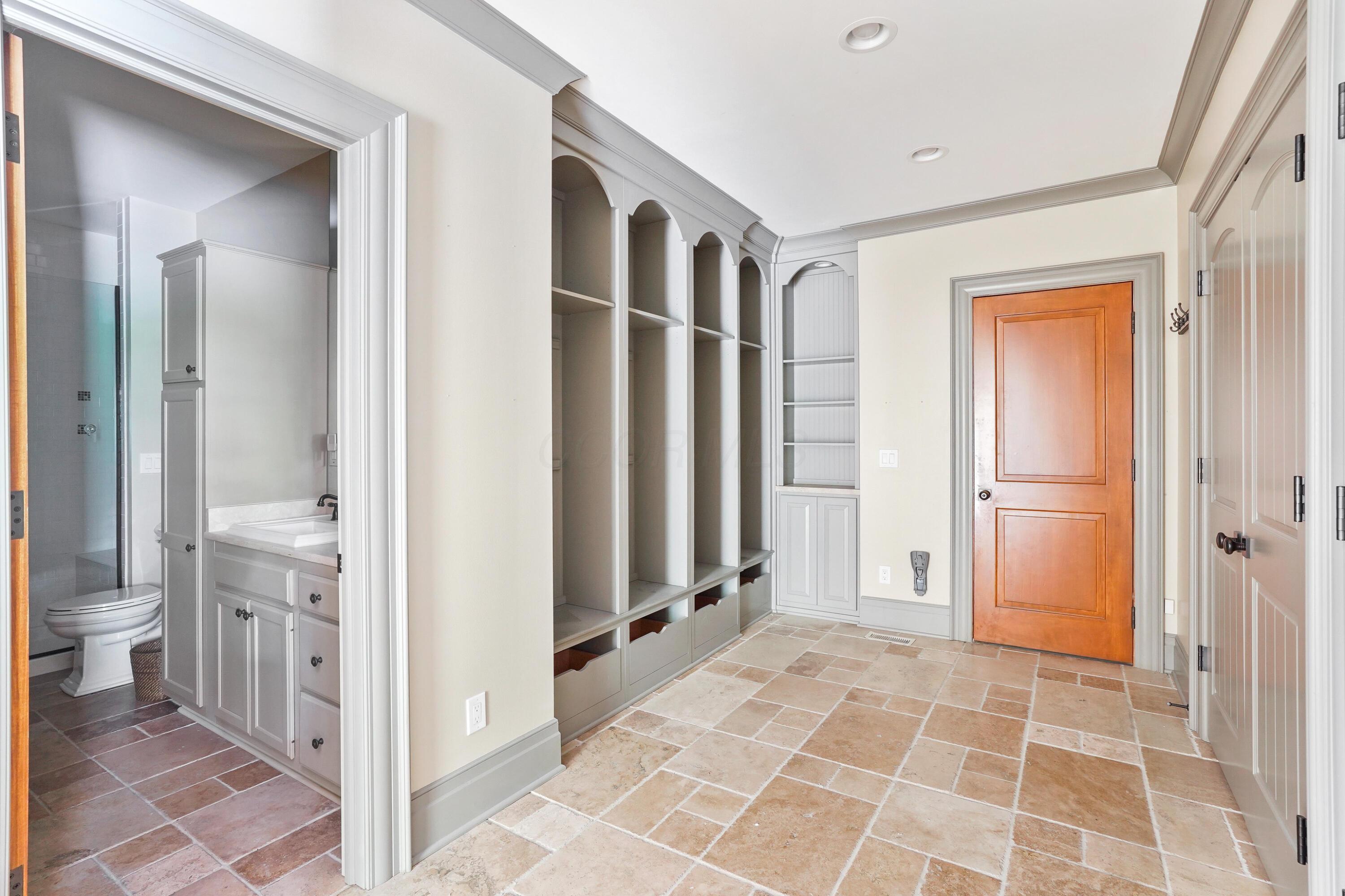 8108 Harriott Road Dublin, OH 43017 - Photo 24 of 71 Mud room and full bath