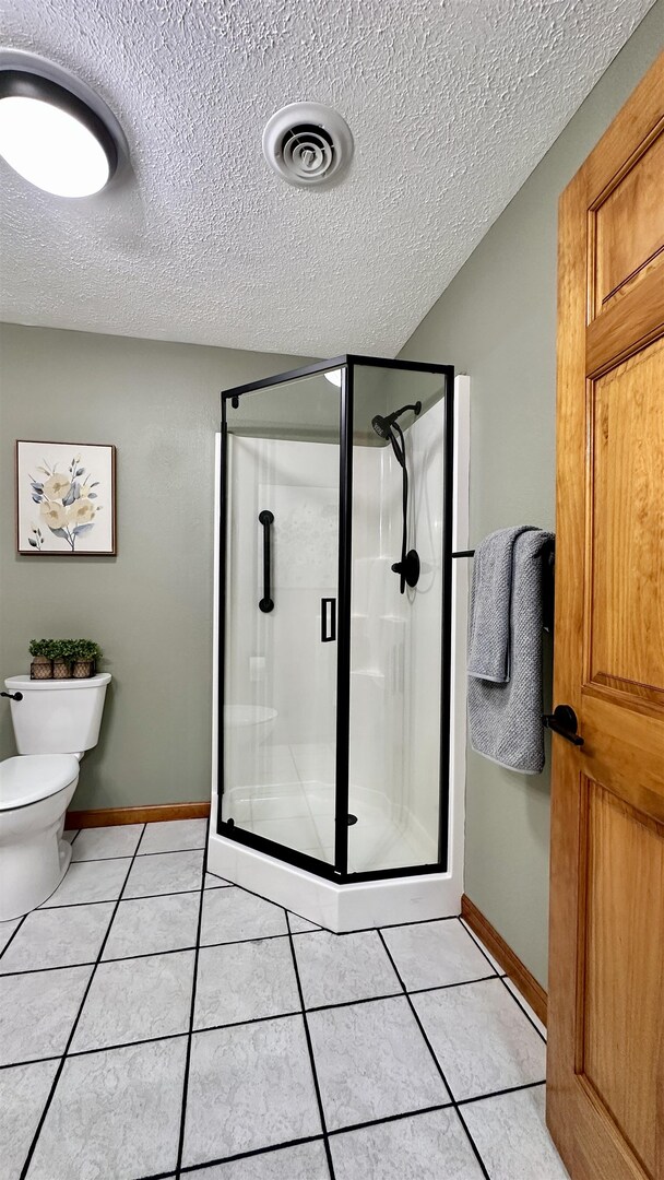 1111 East Elm Street West Frankfort, IL 62896 - Photo 14 of 27 a bathroom with a shower