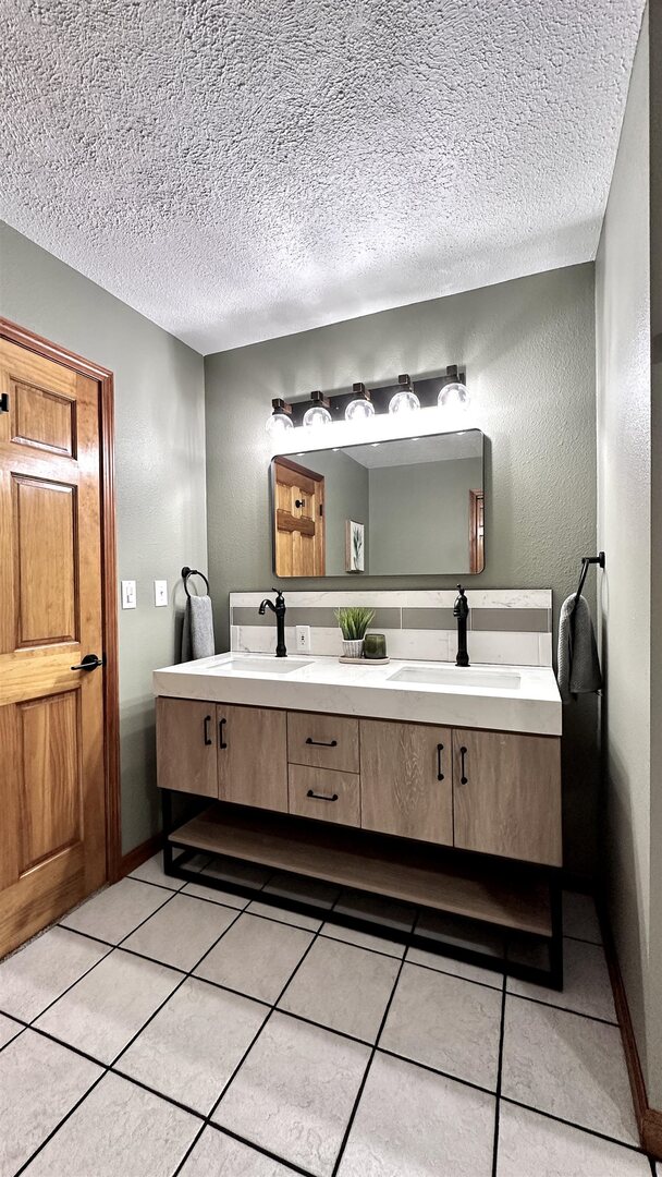 1111 East Elm Street West Frankfort, IL 62896 - Photo 21 of 27 a bathroom with a sink and a mirror