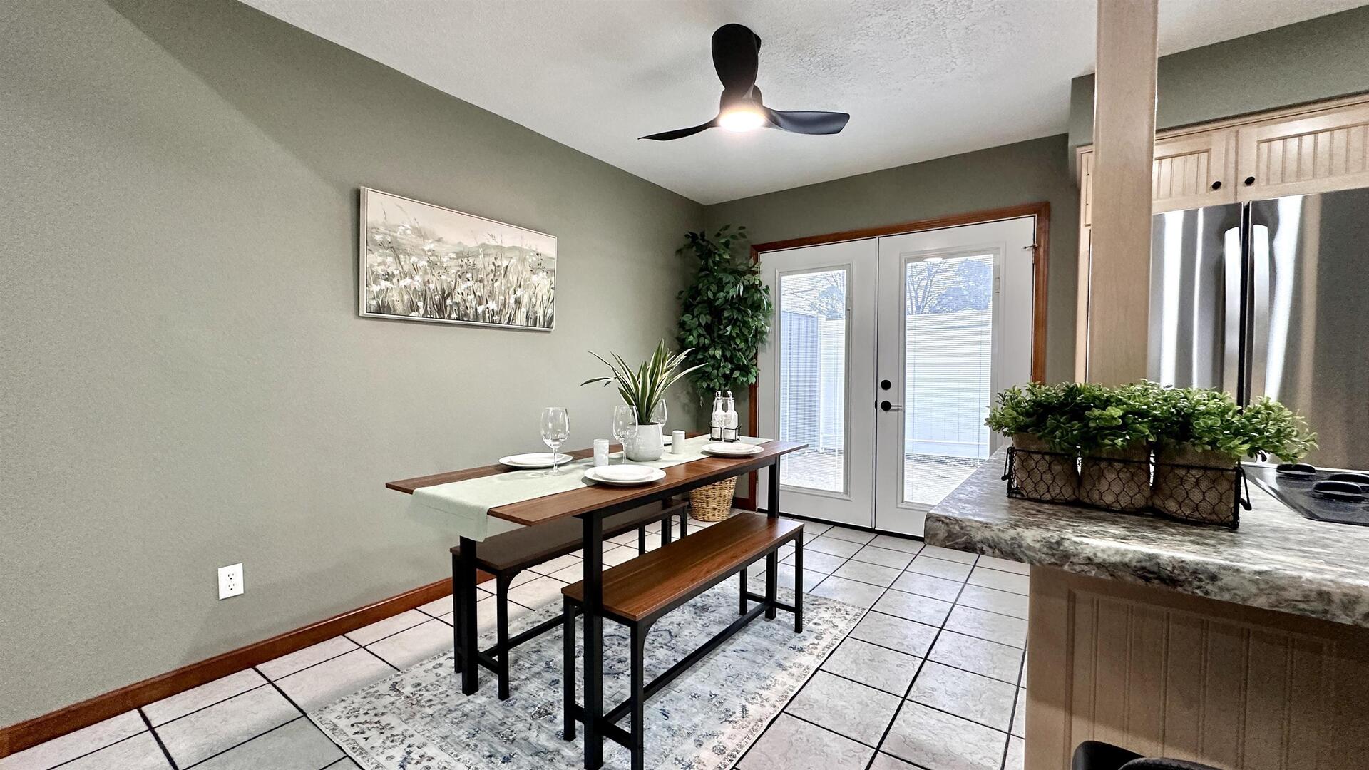 1111 East Elm Street West Frankfort, IL 62896 - Photo 7 of 27 a dining room with a table and chairs