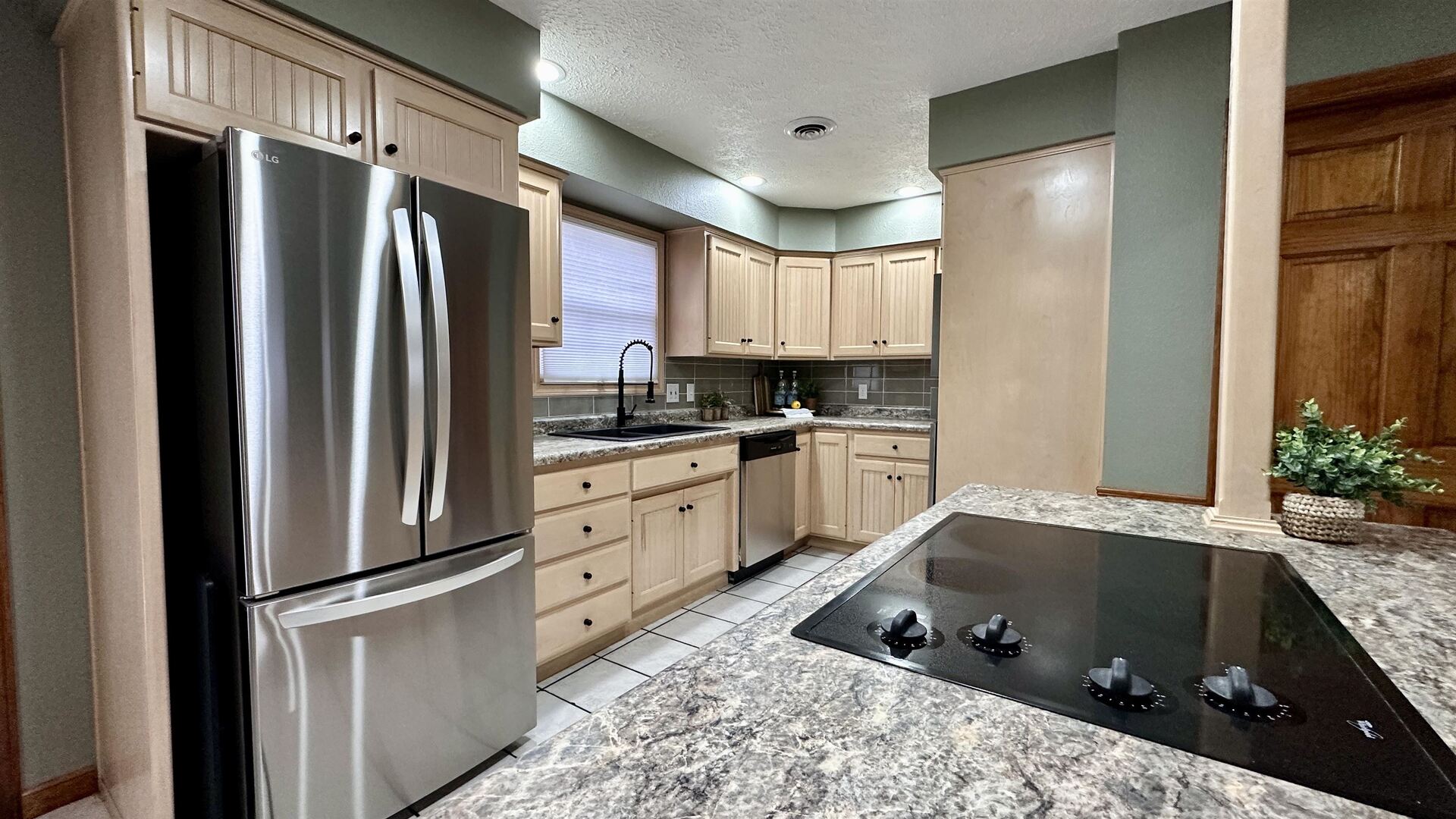 1111 East Elm Street West Frankfort, IL 62896 - Photo 8 of 27 a kitchen with a refrigerator stove and sink