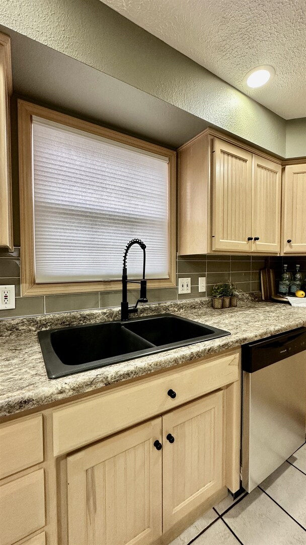 1111 East Elm Street West Frankfort, IL 62896 - Photo 9 of 27 a kitchen with sink a stove and cabinets
