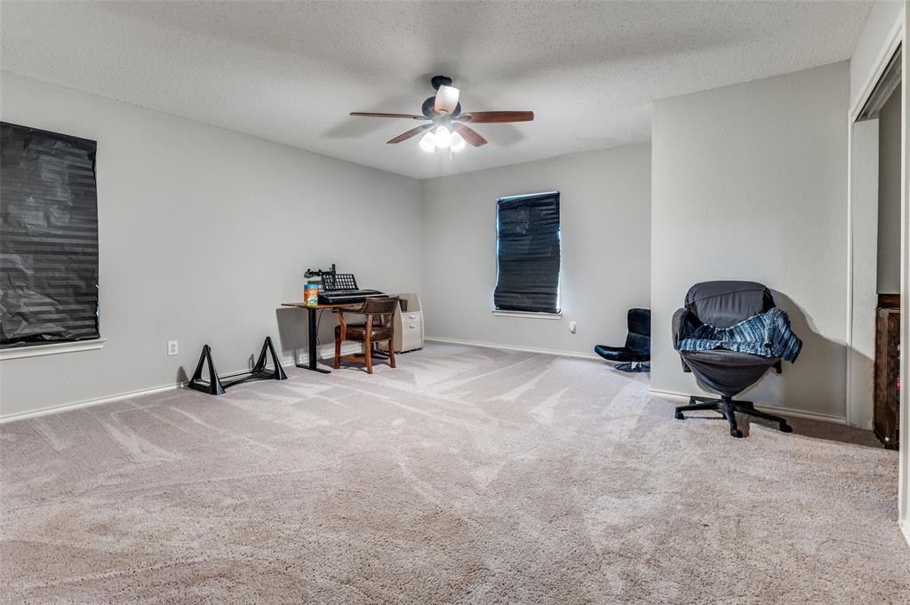 4254 Birch Creek Road Fort Worth, TX 76244 - Photo 20 of 25 a view of a workspace with furniture and a window