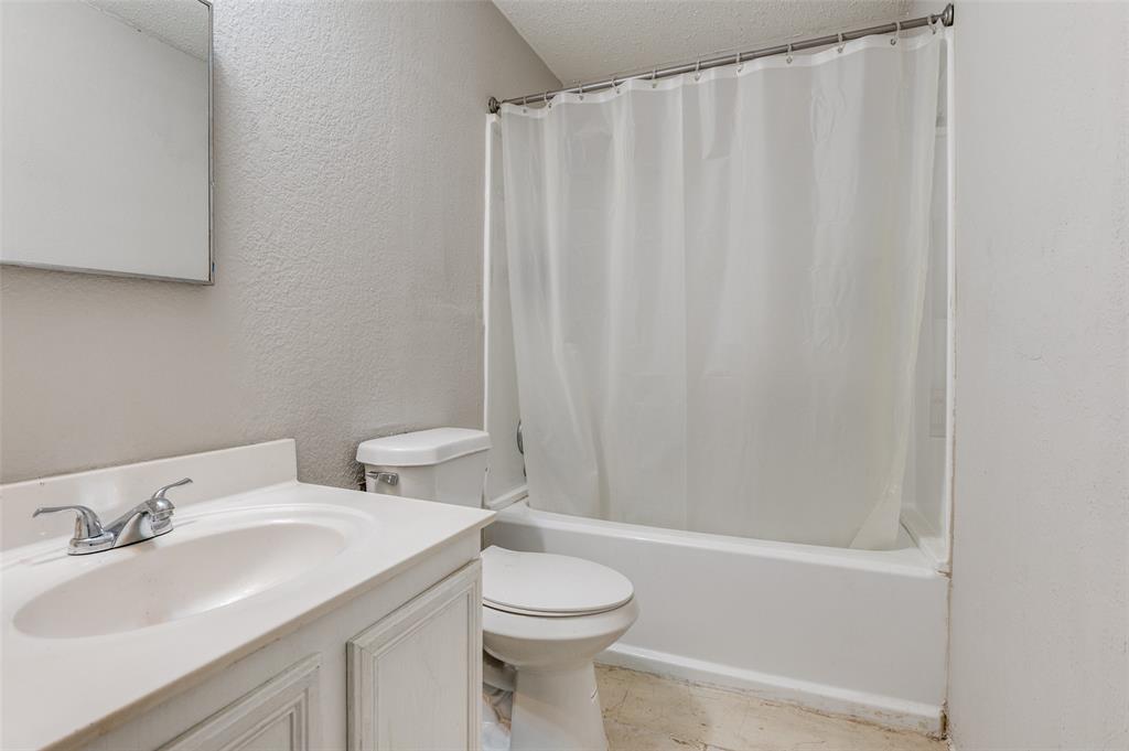 4254 Birch Creek Road Fort Worth, TX 76244 - Photo 21 of 25 a bathroom with a sink and a toilet