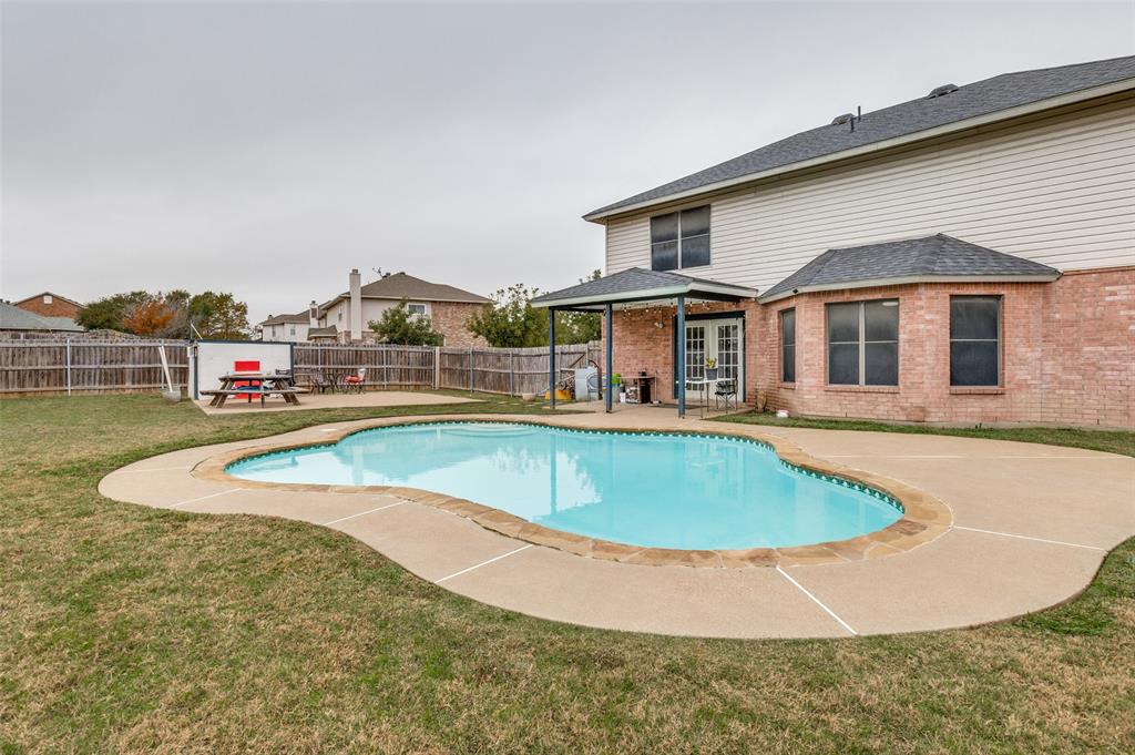 4254 Birch Creek Road Fort Worth, TX 76244 - Photo 23 of 25 a view of a house with pool and chairs