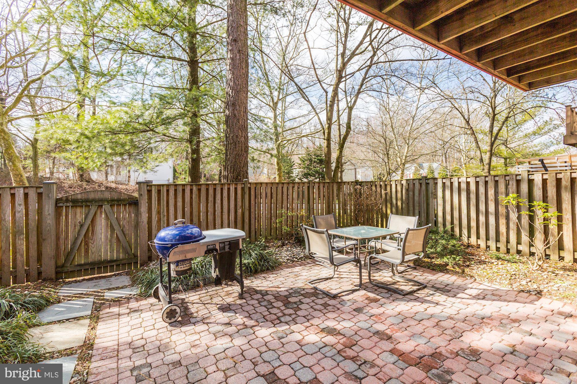 9701 Early Spring Way Columbia, MD 21046 - Photo 32 of 36 Stone patio from walk out level