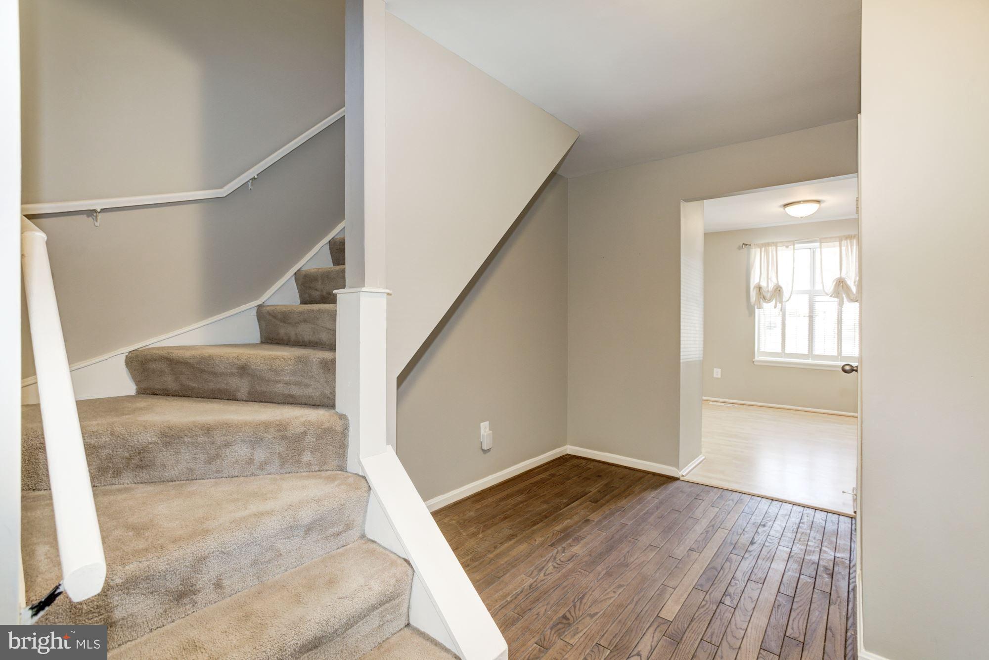9701 Early Spring Way Columbia, MD 21046 - Photo 6 of 36 Stairs to Upper Level