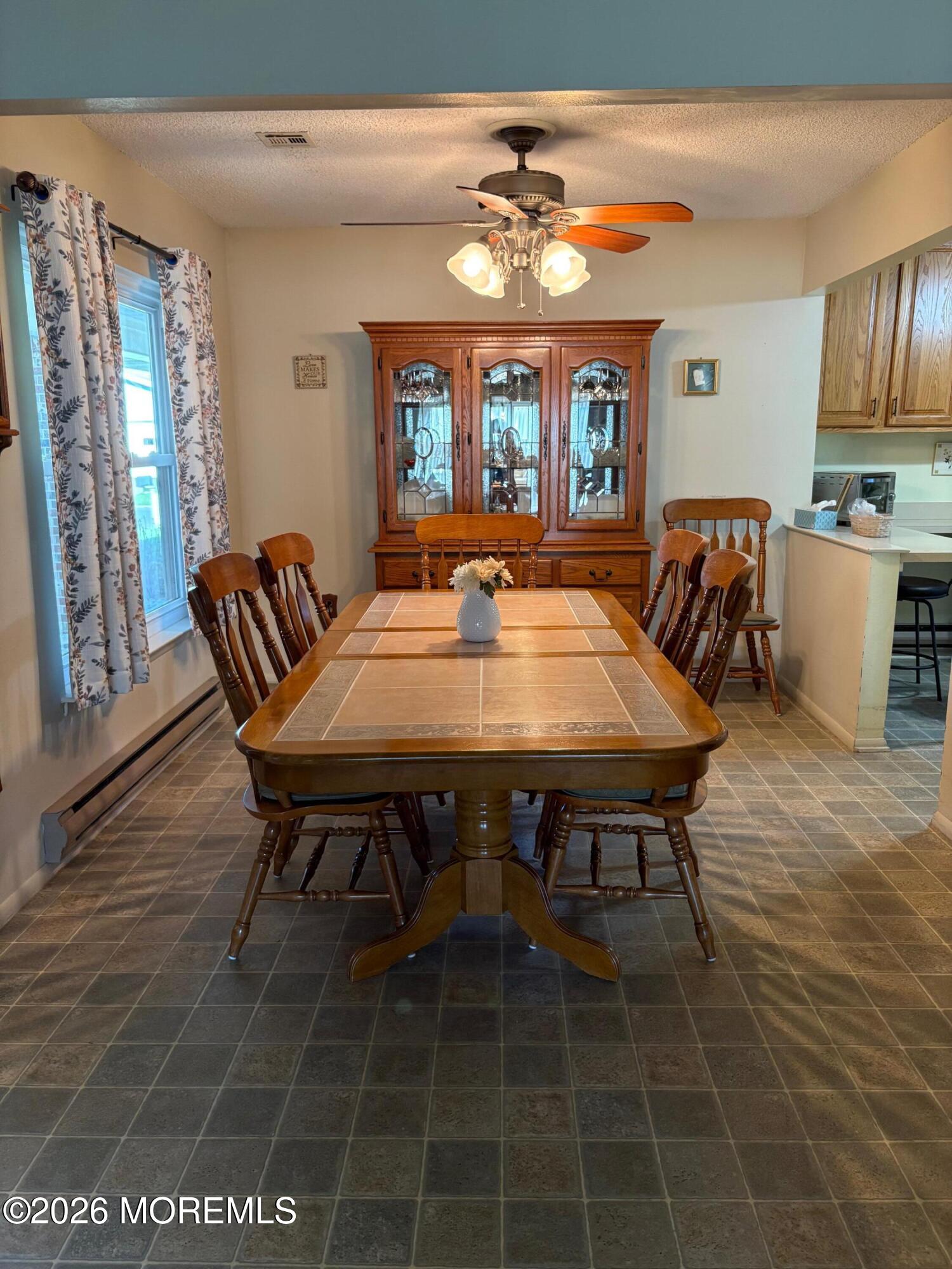 531 A Ardmore Road, Unit 531A Monroe Township, NJ 08831 - Photo 2 of 6 a view of a dining room with furniture