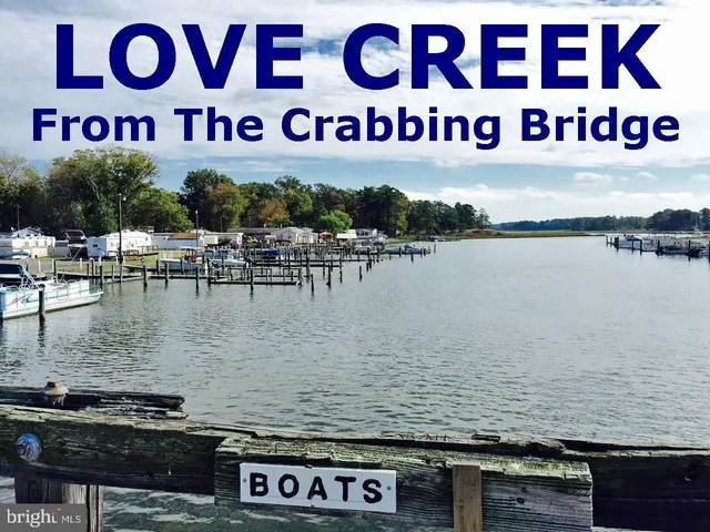 a view of a sign board with lake view