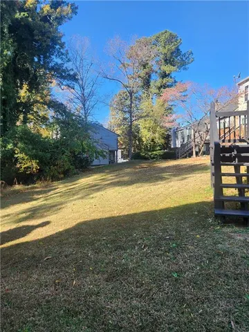 a view of an ocean and a building in the background