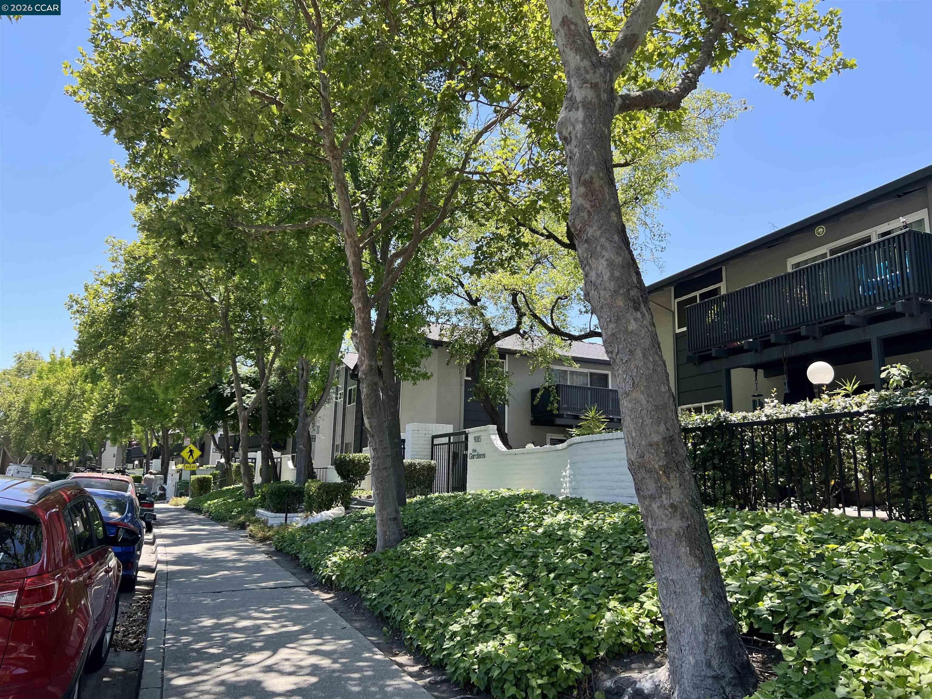 9085 Alcosta Boulevard, Unit 424 San Ramon, CA 94583 - Photo 20 of 21 a front view of a house with a yard
