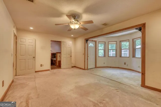 an empty room with windows