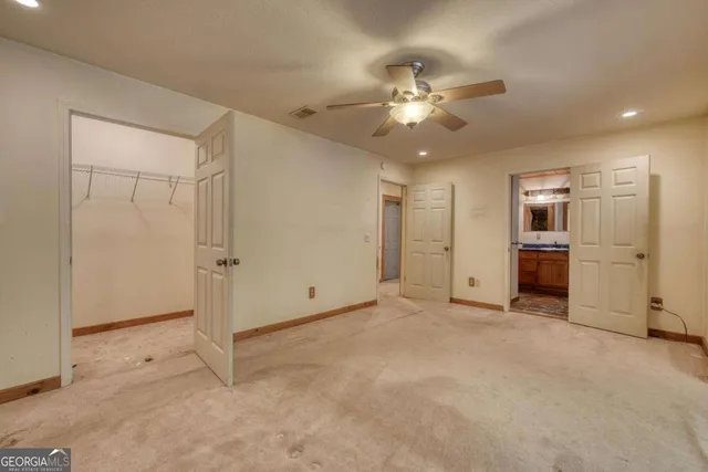 a bathroom with a double vanity sink and mirror