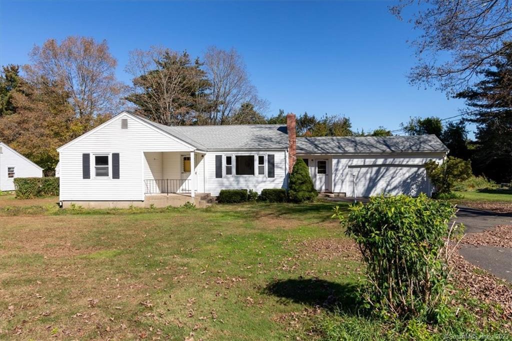 86 West Granby Road Granby, CT 06035 - Photo 1 of 1 a front view of a house with a yard