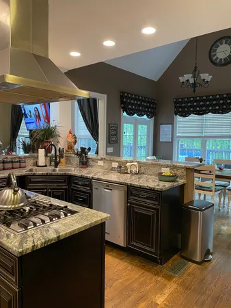 a kitchen with a stove and a sink