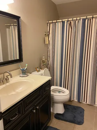 a bathroom with a sink and a toilet