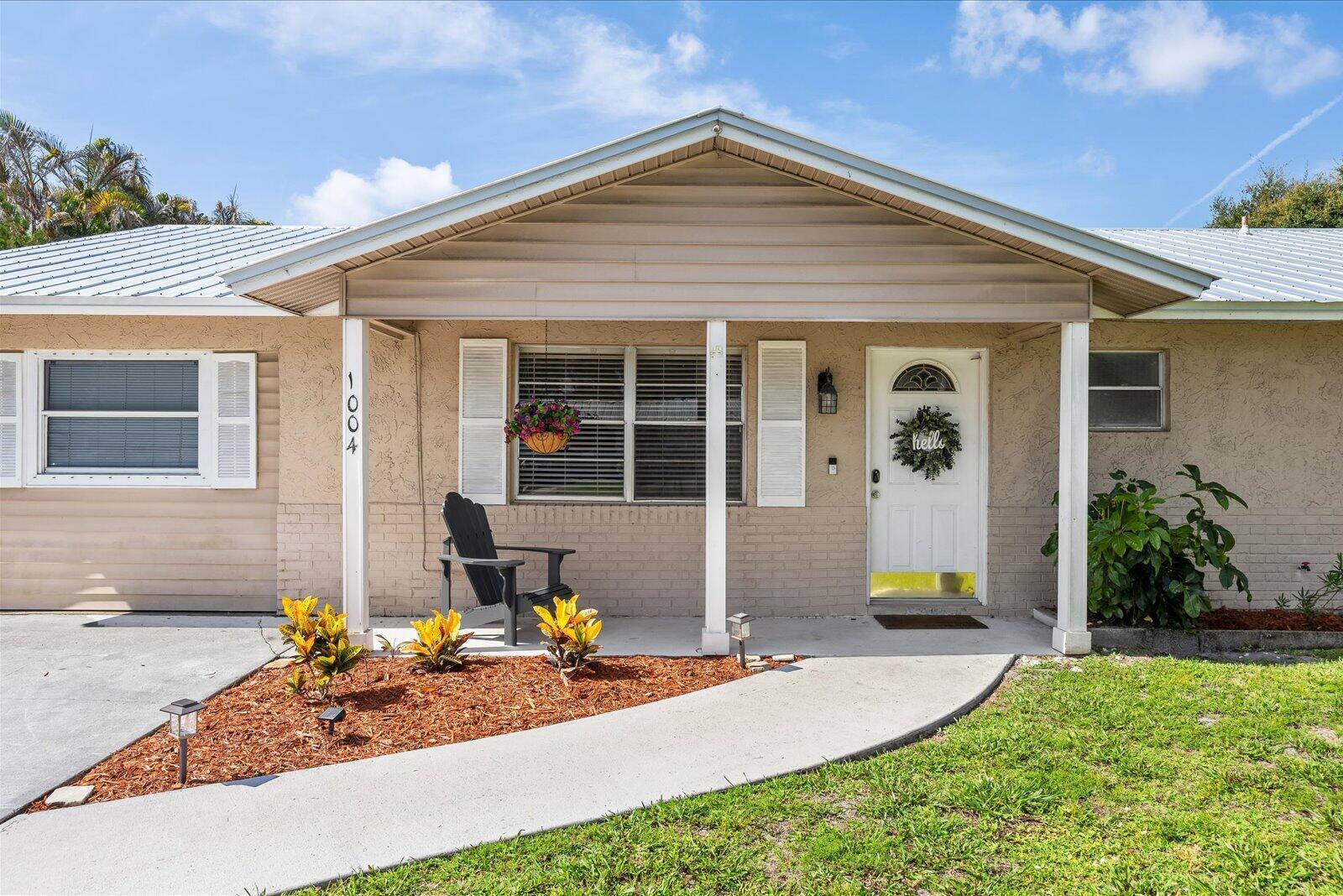 1004 Northwest 16th Place Stuart, FL 34994 - Photo 3 of 42 03_beyc6a3d80573d8e9