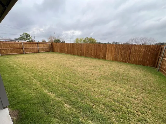 a view of an outdoor space and a yard