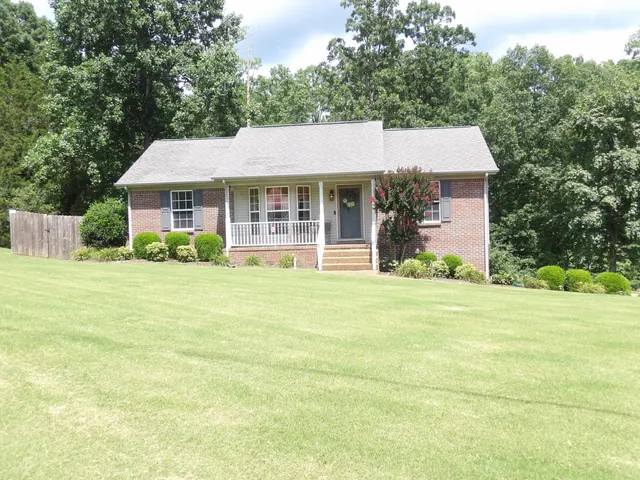 front view of a house with a yard