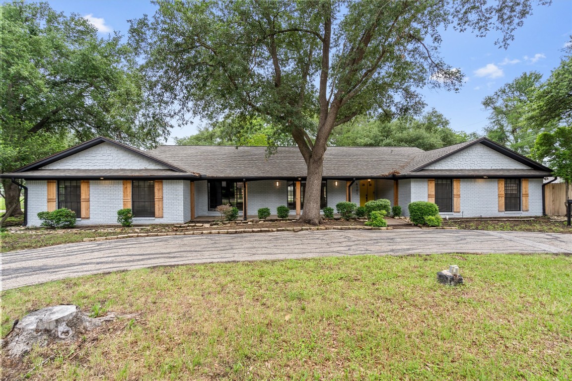 4101 Briar Cliff Road Temple, TX 76502 - Photo 2 of 40 a front view of a house with a yard