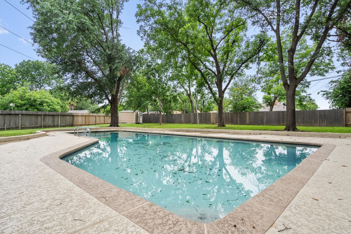 4101 Briar Cliff Road Temple, TX 76502 - Photo 37 of 40 a view of a swimming pool with a patio