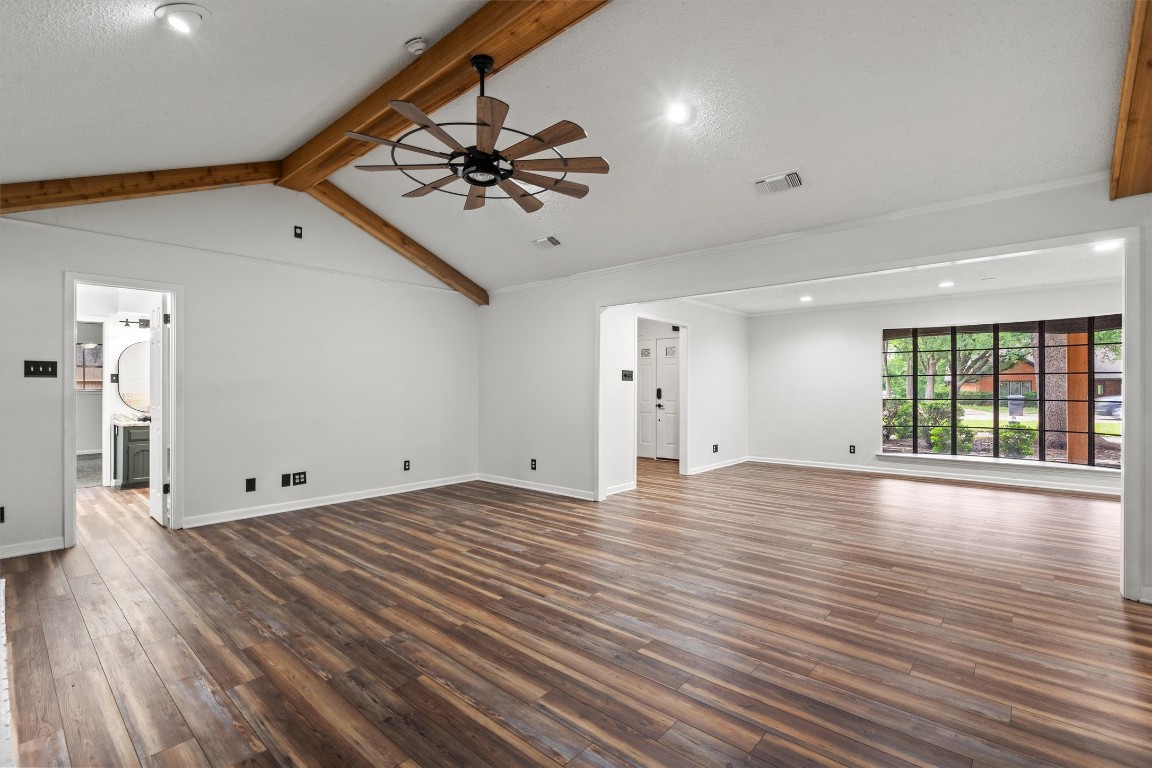 4101 Briar Cliff Road Temple, TX 76502 - Photo 9 of 40 a view of an empty room with a window and wooden floor