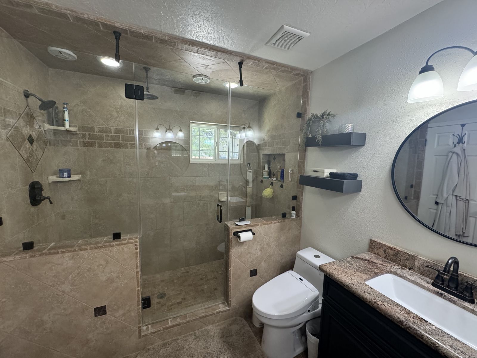 1024 Las Cruces Avenue Ridgecrest, CA 93555 - Photo 23 of 37 a bathroom with a sink toilet and shower
