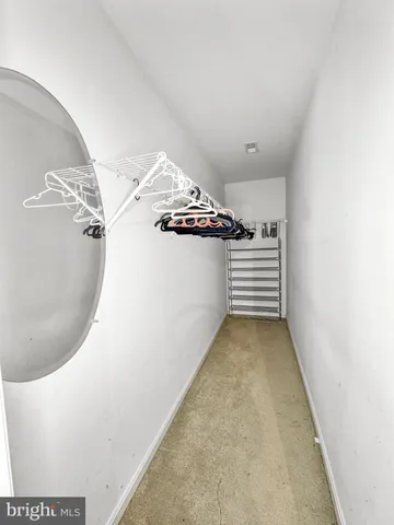 a view of a room with an empty space