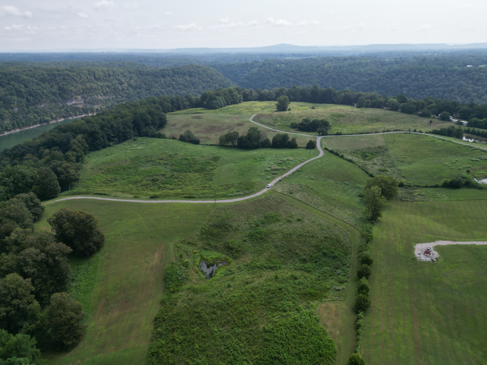0 Potts Camp Road Smithville, TN 37166 - Photo 4 of 6 an aerial view of residential houses with outdoor space and trees