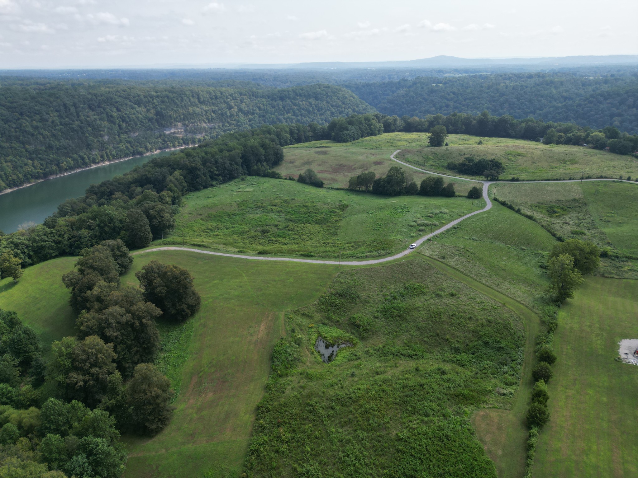 0 Potts Camp Road Smithville, TN 37166 - Photo 5 of 6 an aerial view of residential houses with outdoor space and trees