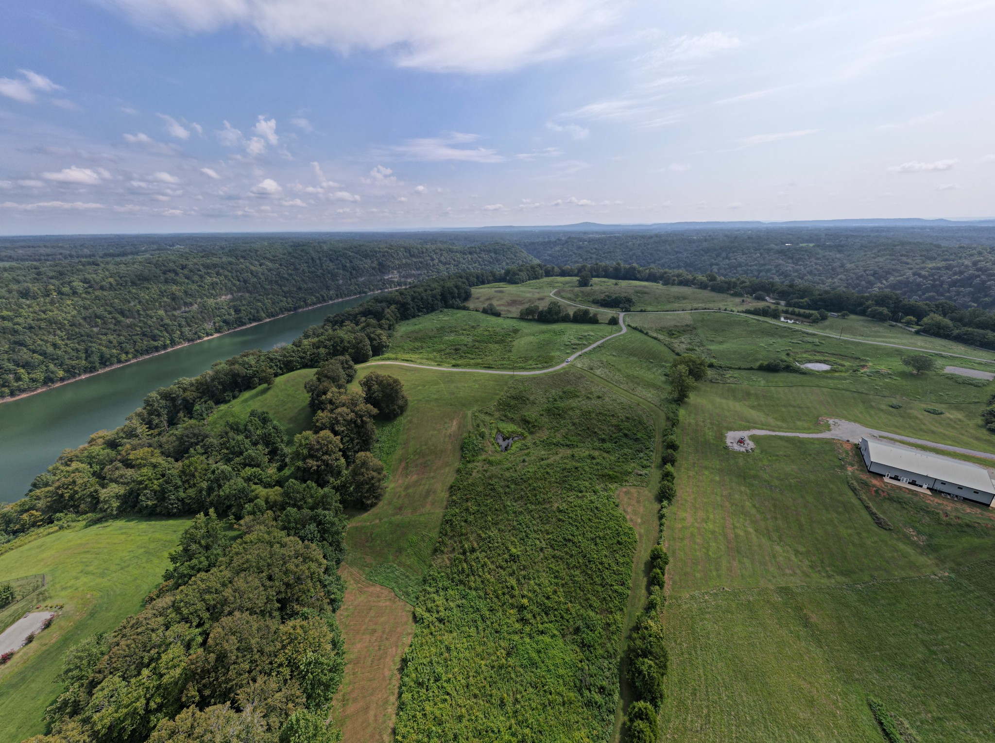 0 Potts Camp Road Smithville, TN 37166 - Photo 6 of 6 a view of a lake with a yard
