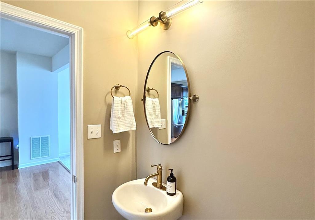 204 Eagle Drive Cranberry Township, PA 16066 - Photo 16 of 34 a bathroom with a sink and a mirror
