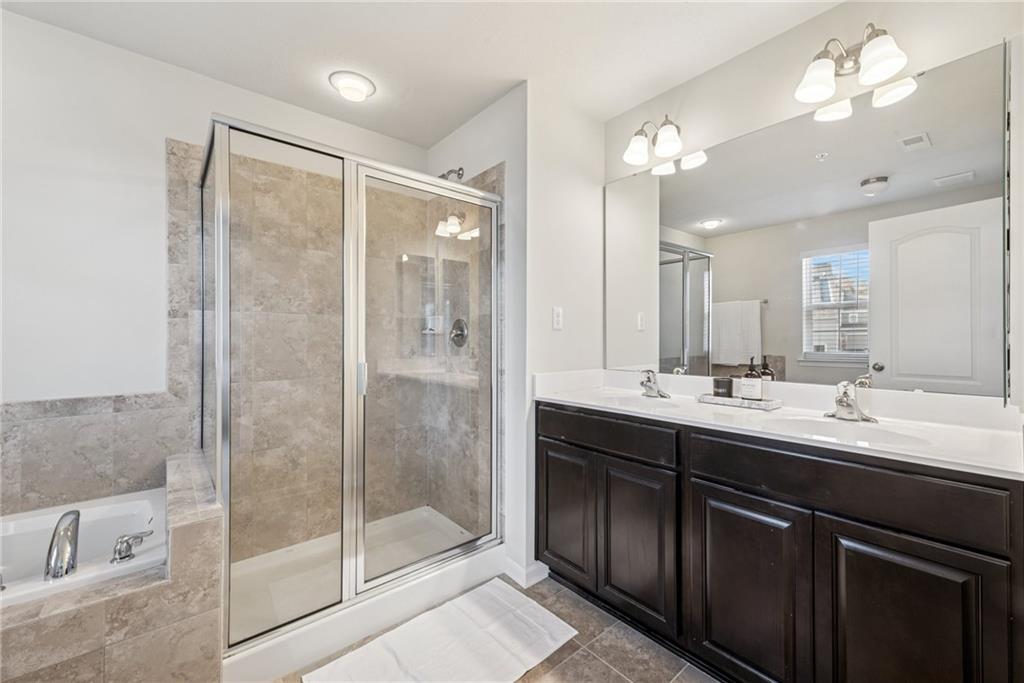 204 Eagle Drive Cranberry Township, PA 16066 - Photo 20 of 34 a bathroom with a double vanity sink mirror and shower