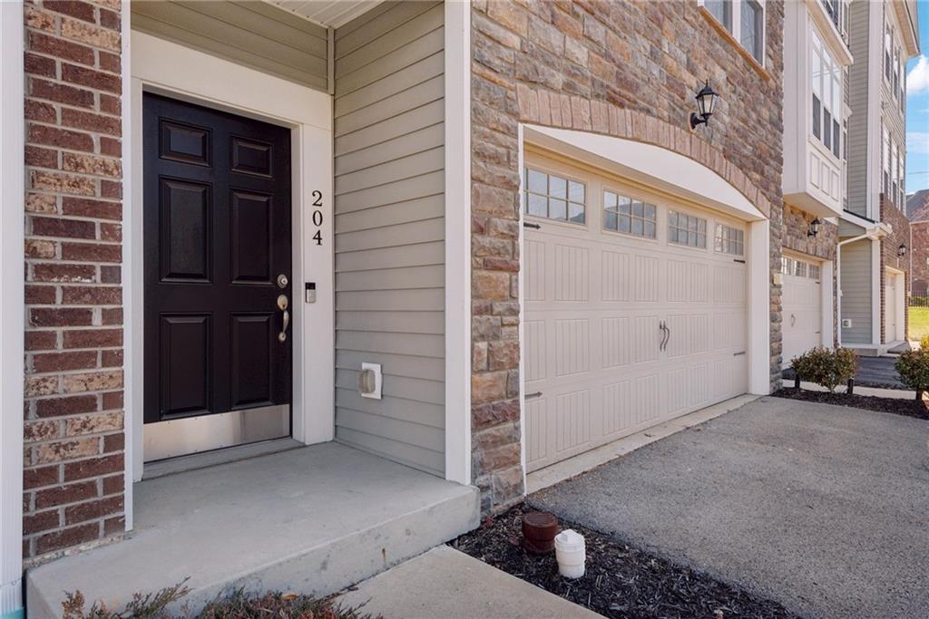 204 Eagle Drive Cranberry Township, PA 16066 - Photo 2 of 34 an entrance view of a building