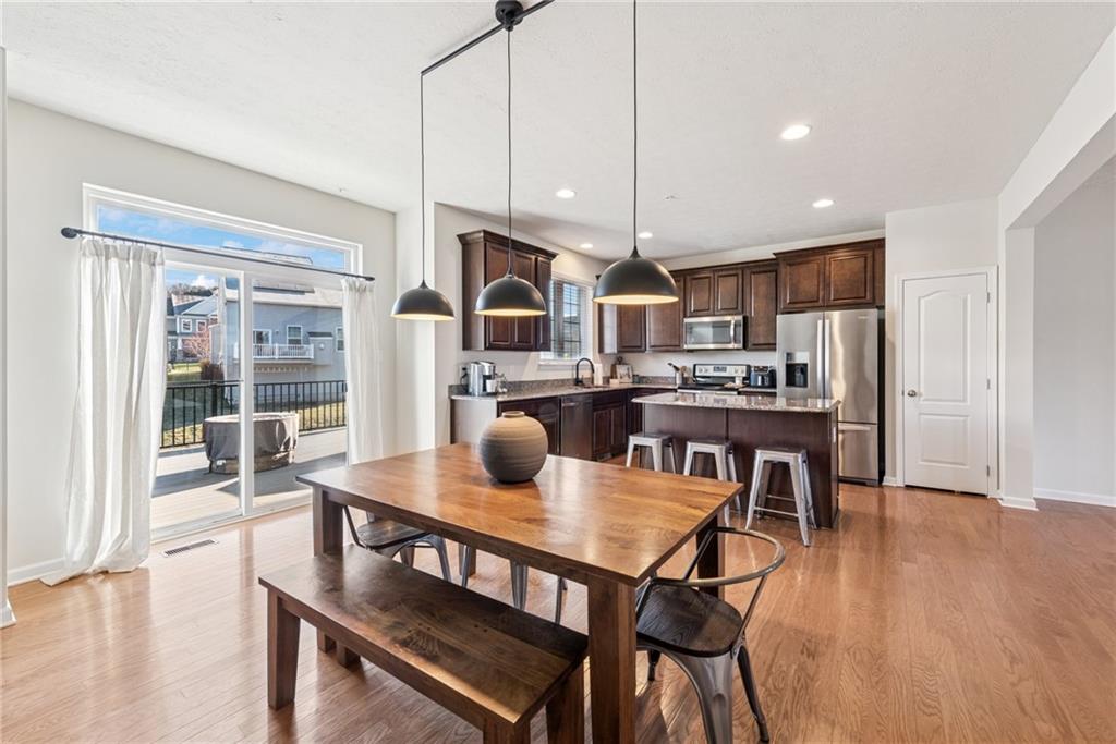 204 Eagle Drive Cranberry Township, PA 16066 - Photo 4 of 34 a view of a dining room with furniture window and wooden floor