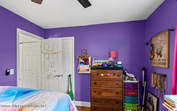 a bed room with a bed and a bed