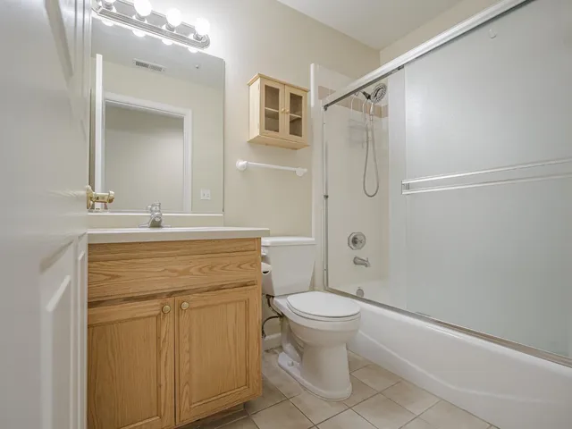 a picture of a bench in a white building