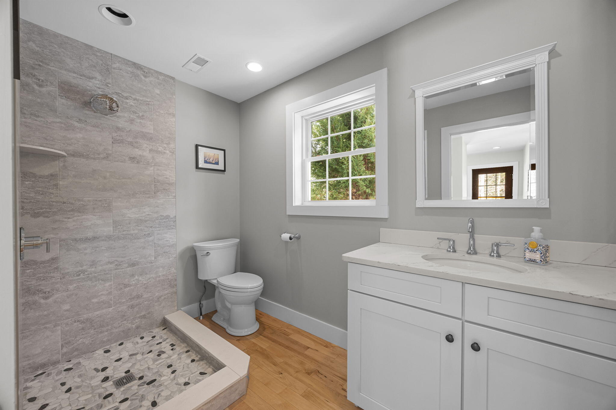 174 Cross Neck Road Marion, MA 02738 - Photo 15 of 41 a bathroom with a sink a toilet and a mirror