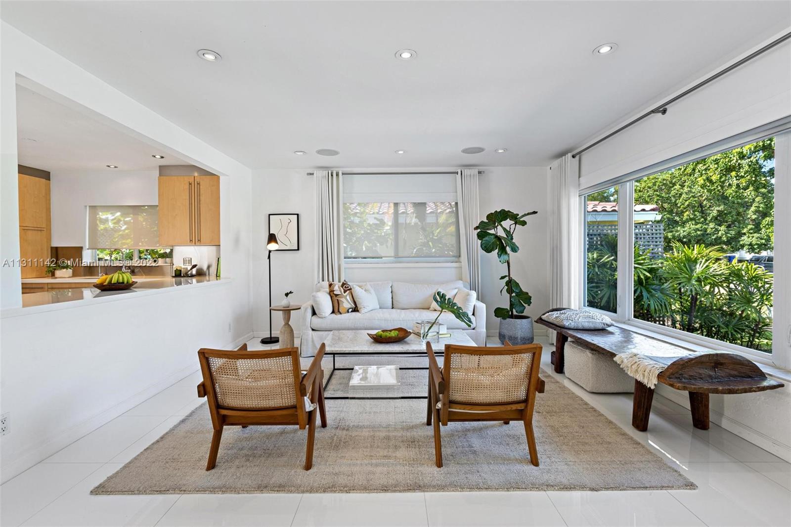 1314 Fillmore Street Hollywood, FL 33019 - Photo 5 of 47 a living room with furniture and a large window