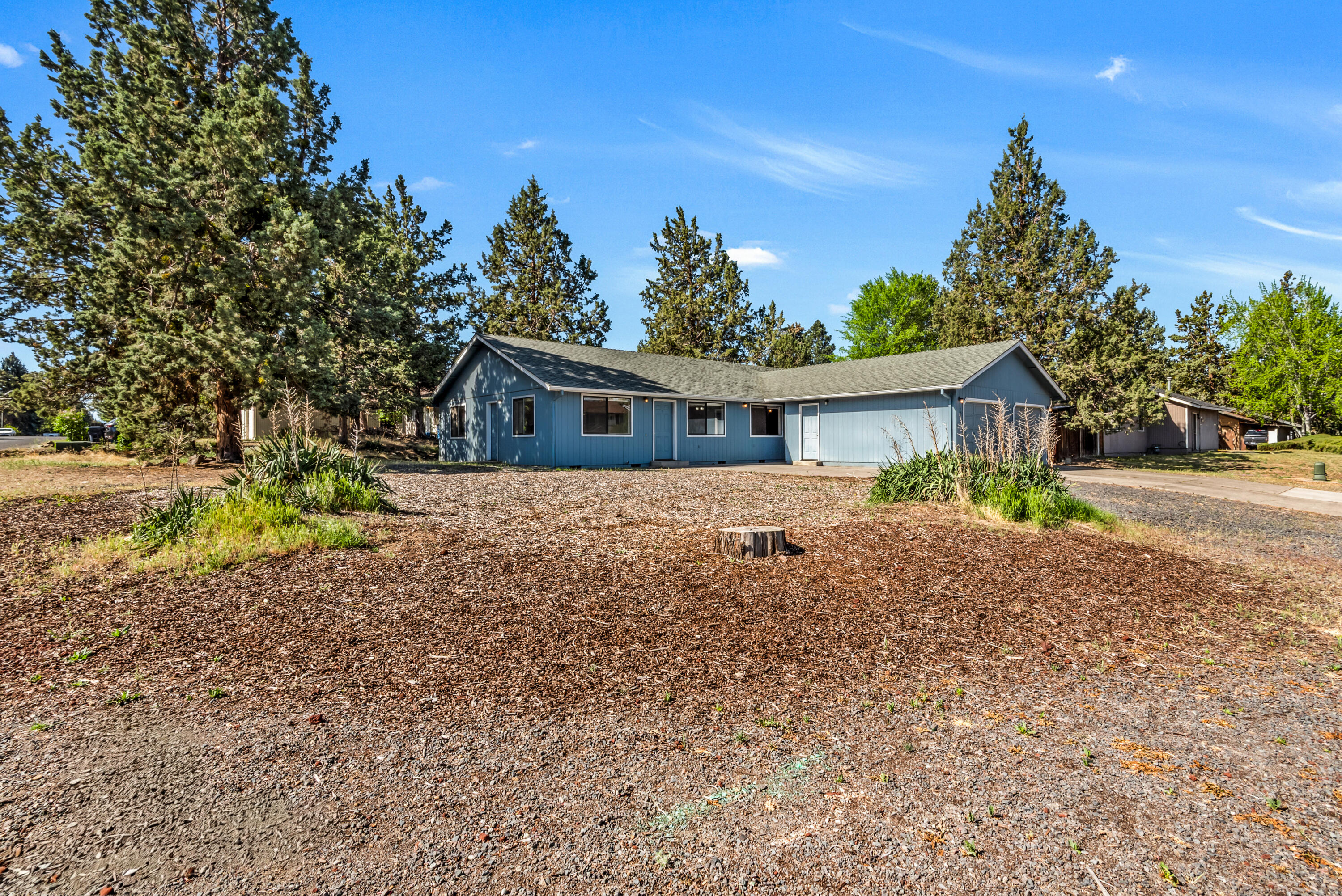 1916 Northeast Wichita Way Bend, OR 97701 - Photo 4 of 38 front view of house with a yard