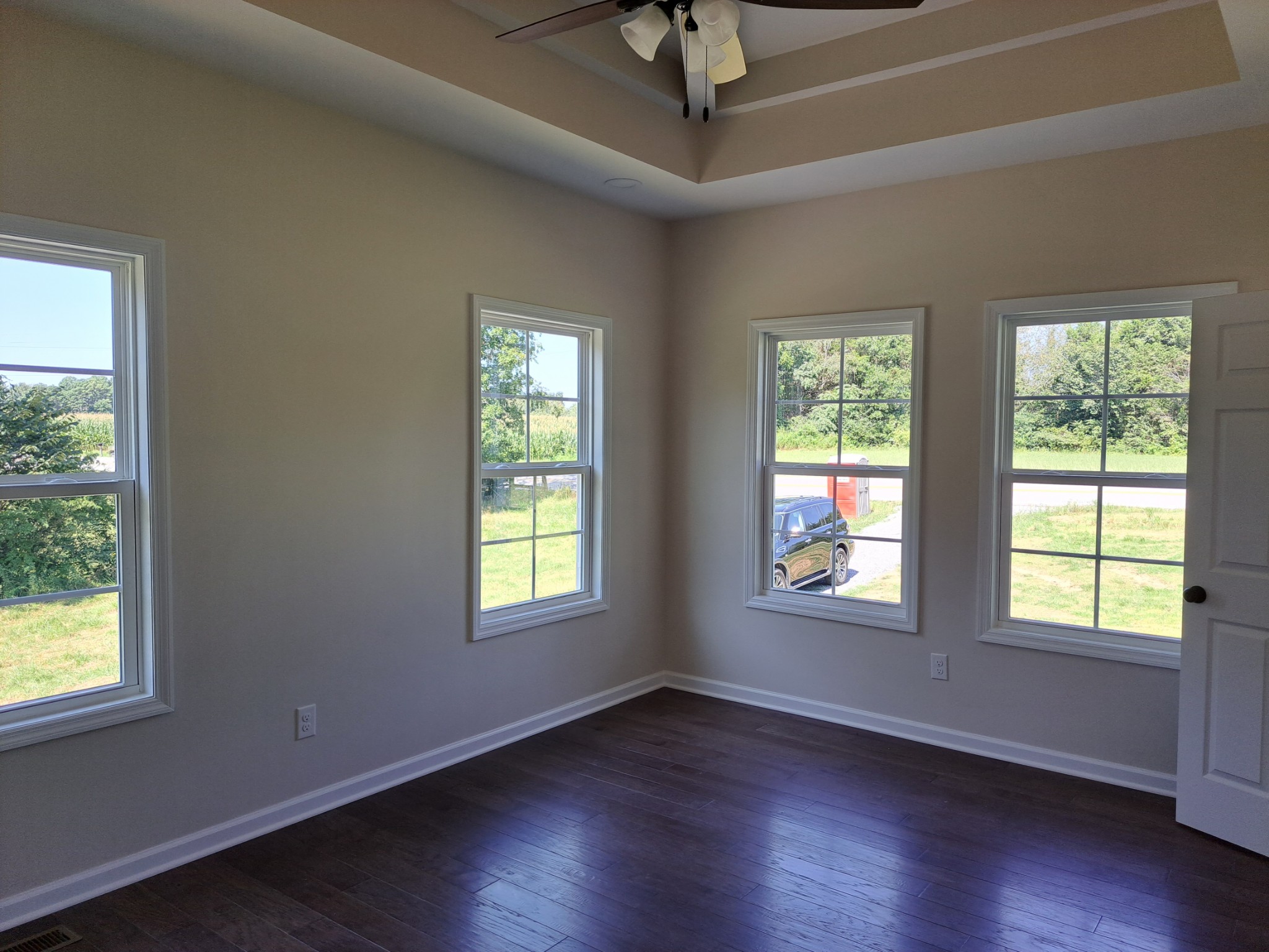 989 Carthage Road Red Boiling Springs, TN 37150 - Photo 15 of 19 a view of an empty room with wooden floor and a window