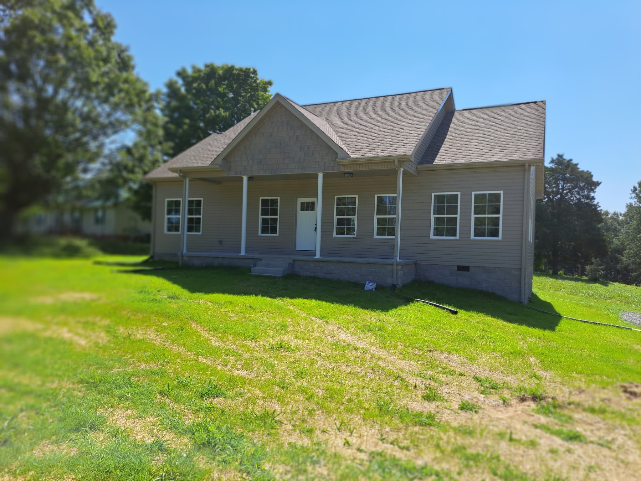 989 Carthage Road Red Boiling Springs, TN 37150 - Photo 2 of 19 front view of a house with a yard