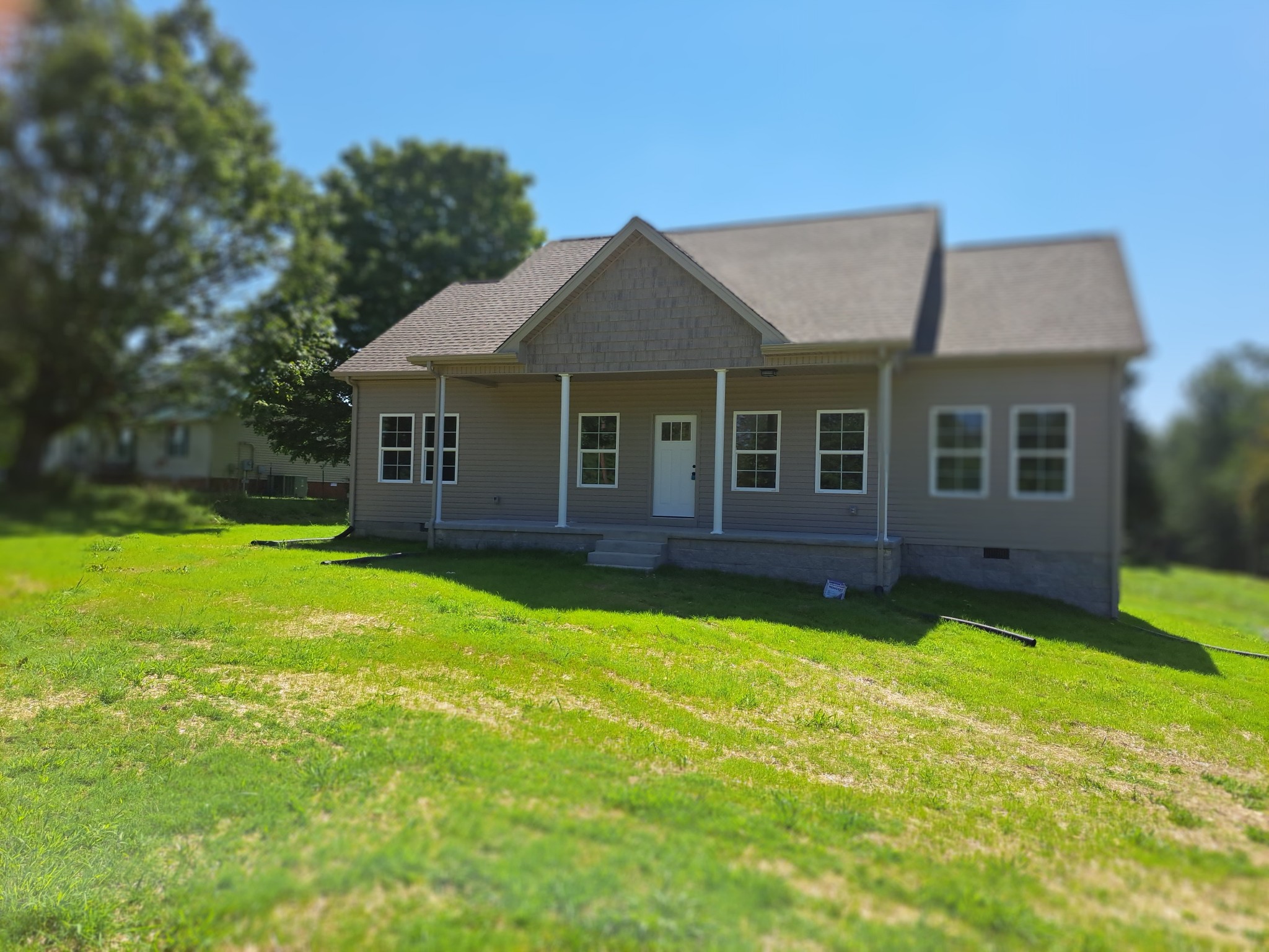 989 Carthage Road Red Boiling Springs, TN 37150 - Photo 3 of 19 a view of a house with a yard