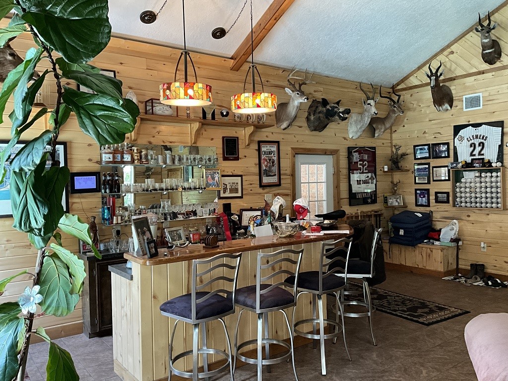 416 Division Street Jewett, TX 75846 - Photo 13 of 36 a view of a dining room with furniture and chandelier